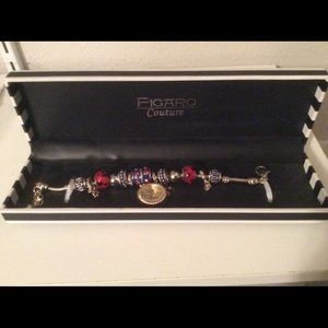 Ladies red/blue beaded wrist watch, new in box